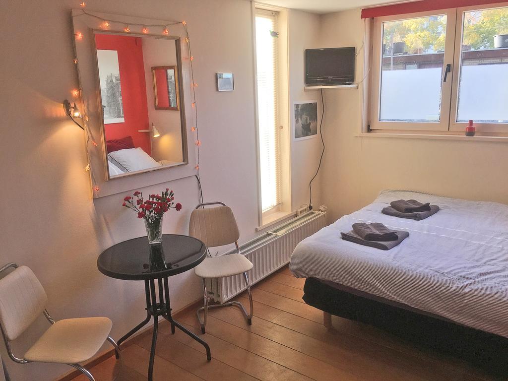 Couette-café Houseboat Westerdok Amsterdam